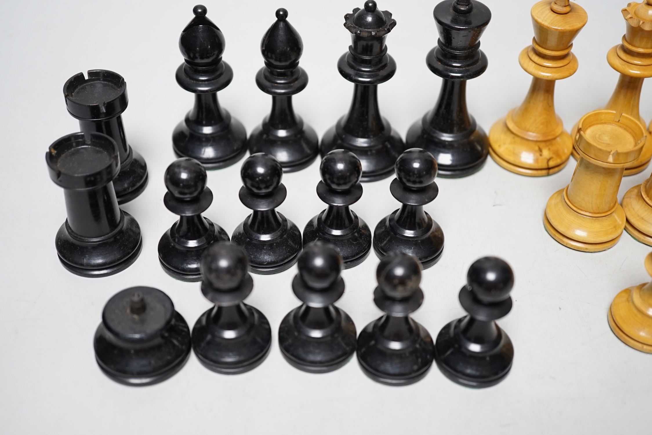 A Staunton pattern lead weighted part boxwood and ebony chess set, kings 8.3cm high (incomplete, lacking both black knights)